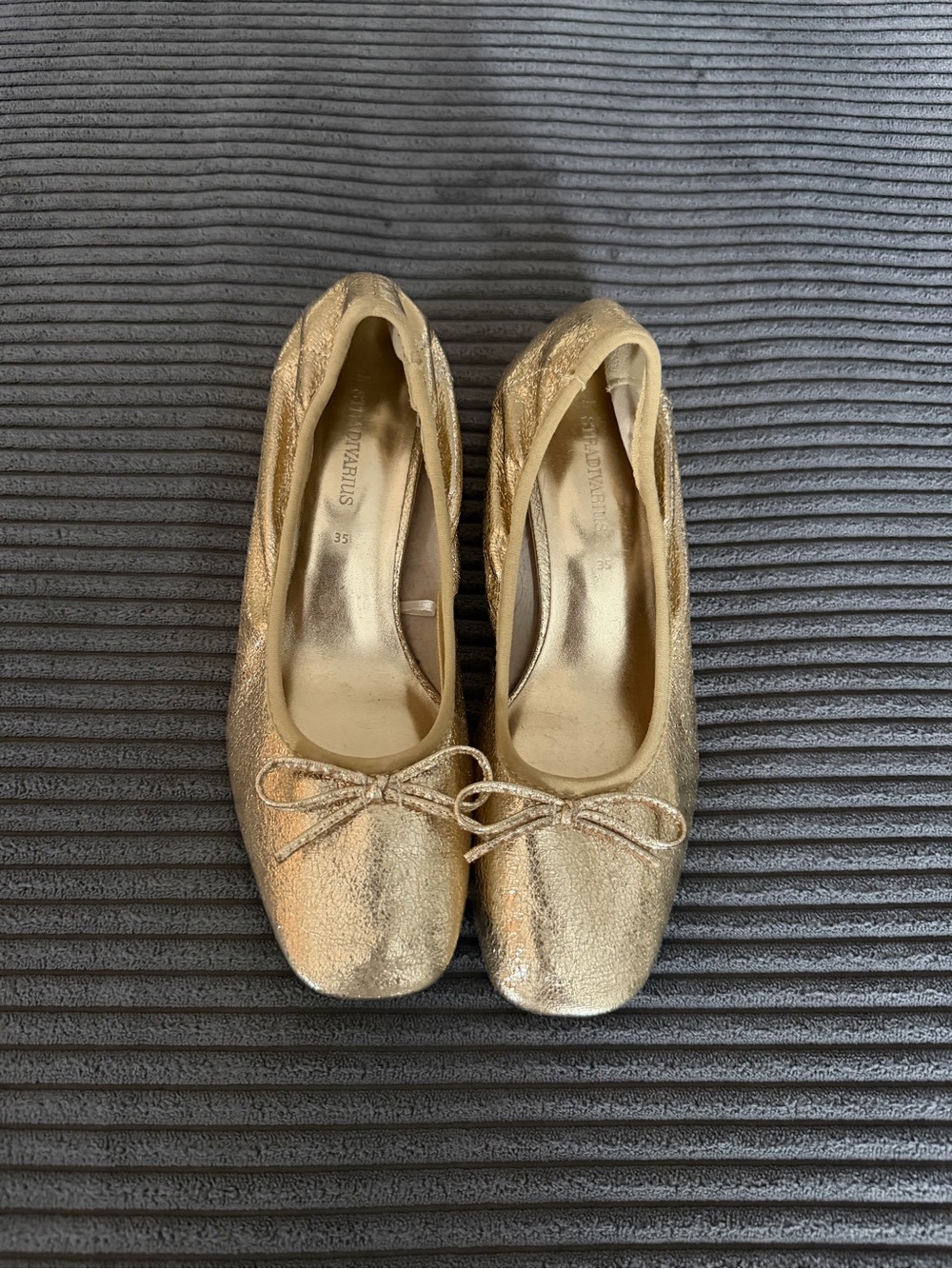 stradivarius Metallic Gold Ballet Flats with Bow